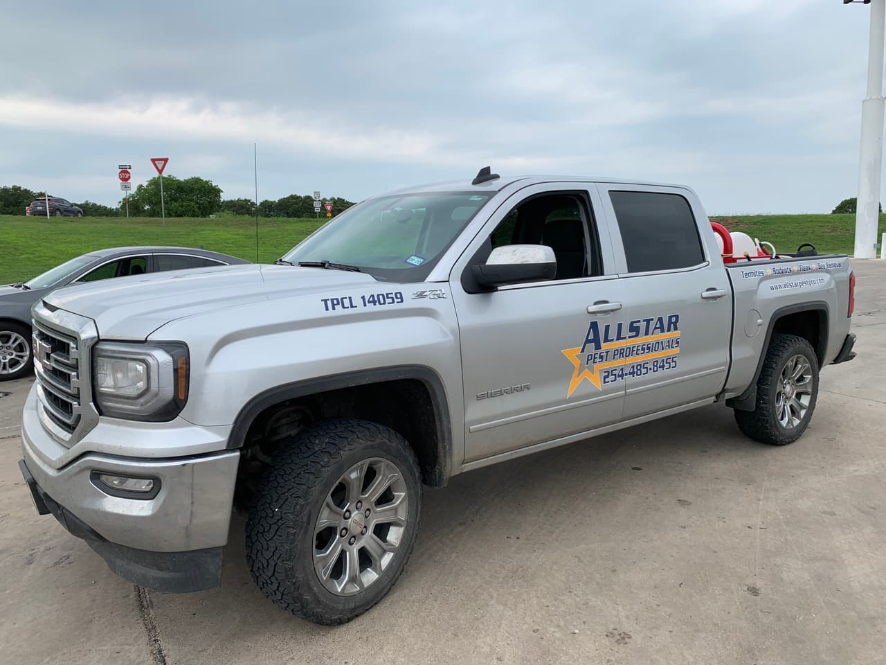 Allstar Pest Professionals company truck with the Allstar logo and phone number 254-485-8455 on the door